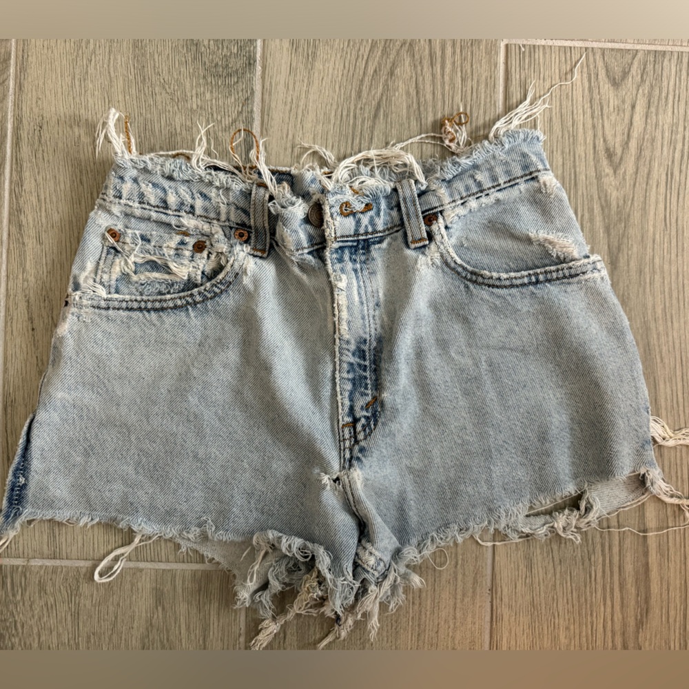 Vintage Levi’s Distressed Light Blue Denim Shorts